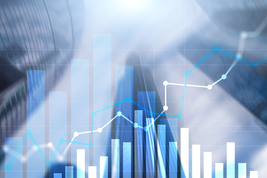 A bar graph is shown with various shades of blue and white colouring. A line graph is overlayed in the background moving in a positive direction.